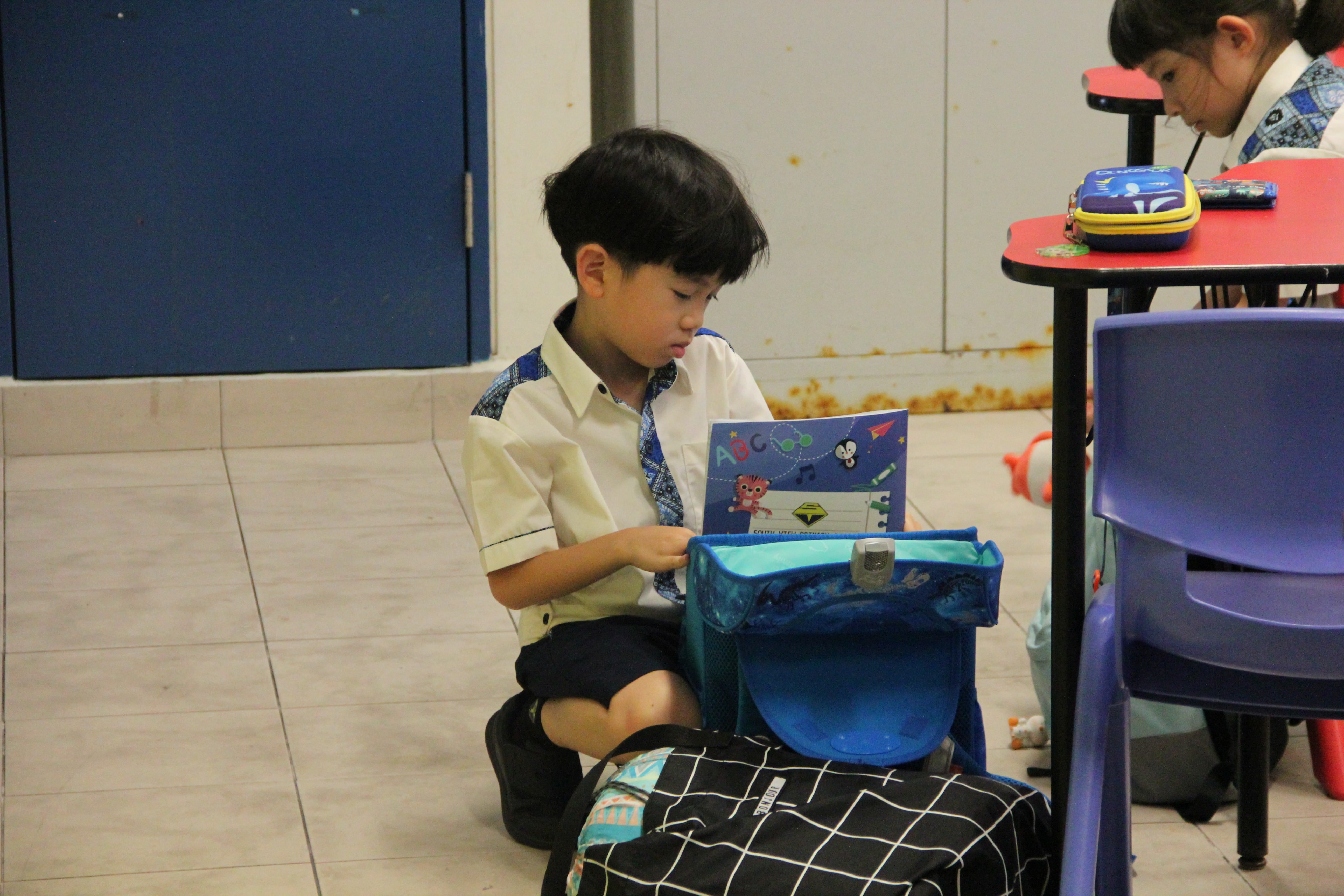 Picture of a student packing his own bag